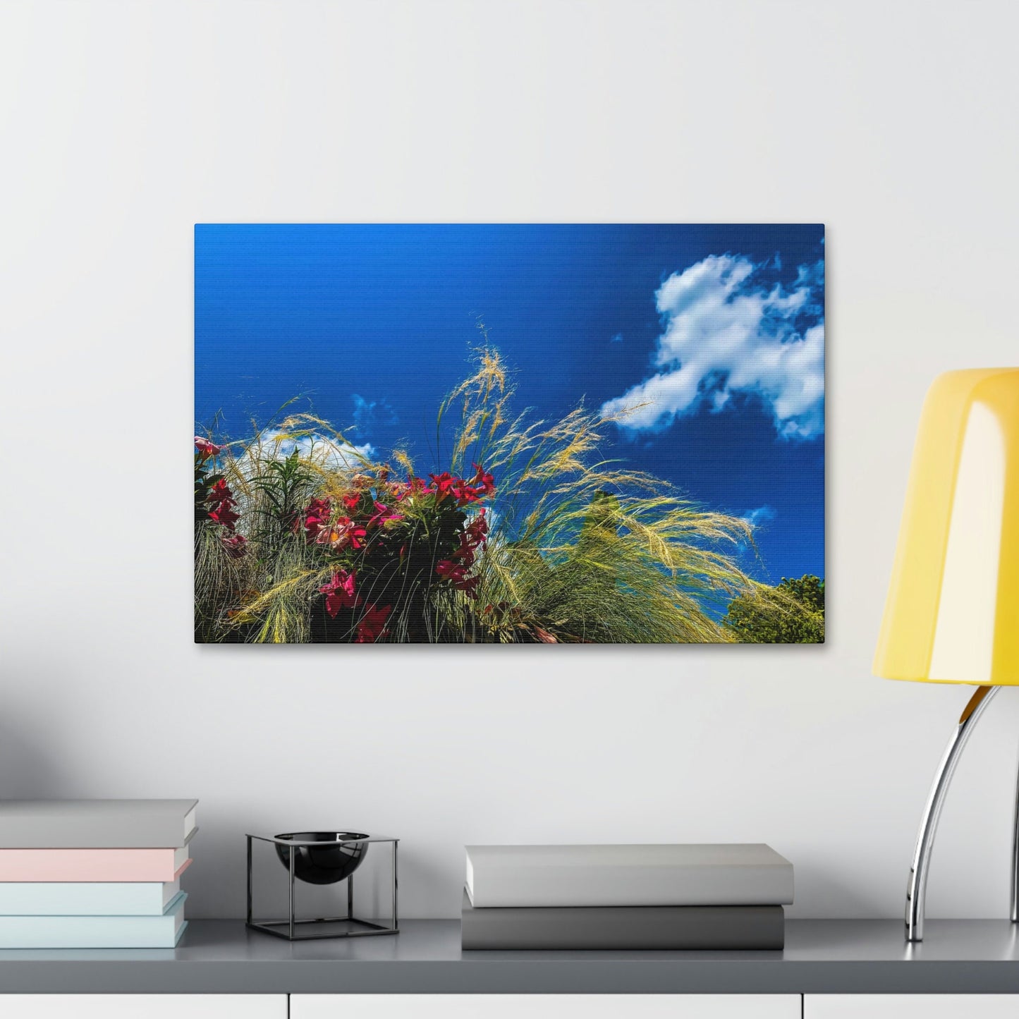 Red Flowers, Green Grass, White Clouds, and a brilliant Blue Sky: Brightly colored photograph print.