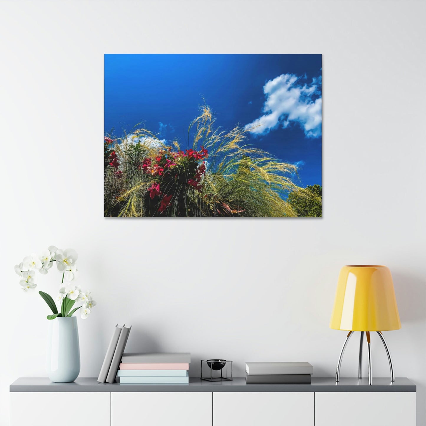 Red Flowers, Green Grass, White Clouds, and a brilliant Blue Sky: Brightly colored photograph print.